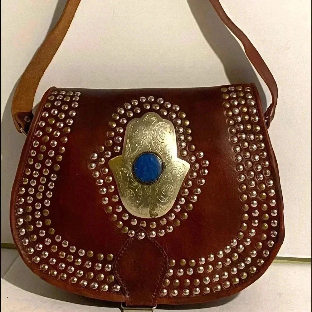 Handmade vintage studded leather moroccan bag